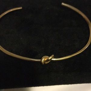 Gold tone knot bracelet